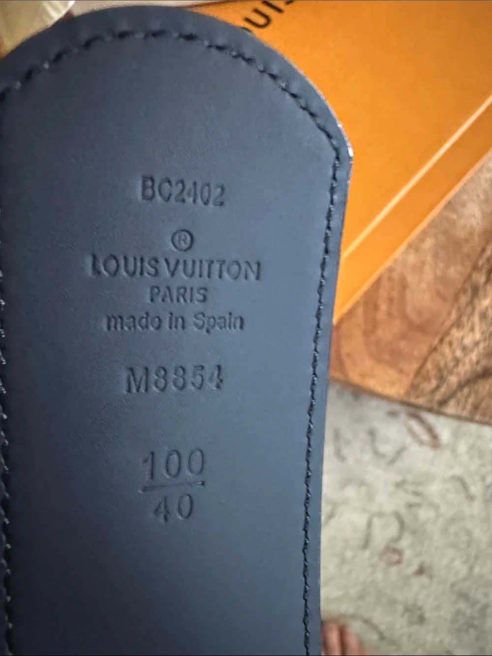 Louis Vuitton Men’s Black Textured Leather LV Buckle Belt